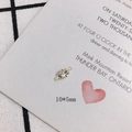 Macro view of 10x5mm gold plated rhinestone connector charm for DIY jewelry making - 5mm Double Loop 14K Gold