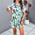Abito corto a fiori verde chiaro con maniche corte e stampe floreali vivaci - Taglia S / Verde