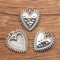 Silver alloy heart crown charms for DIY Halloween jewelry on a wooden background - 27B3-2 Radiant Crown Heart