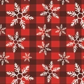 Classic red and black buffalo plaid gift wrapping paper with white snowflake patterns - Snowflake