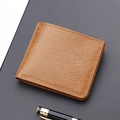 Short bi-fold men's wallet in light brown leather with business pen on dark background - Light Brown