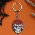 Halloween Totenkopf Schlüsselanhänger mit rotem Helm auf orangefarbenem Hintergrund - Stil 2