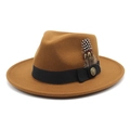 Detail of brown wool fedora hat featuring black grosgrain ribbon and feather accent - M (56-58cm) / Caramel