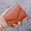 Minimalist orange-brown leather envelope wallet for women with high-quality pebble texture - Brown