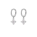 Close-up of silver hoop earrings with shimmering crystal-paved four-leaf clover petals - Silver Clover Earrings