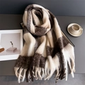 Detailed texture of thick plaid scarf with long tassels beside coffee and a magazine - Brown Beige Light Tan Plaid (WJ137-34)