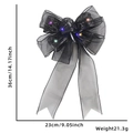 Detail of Halloween black lace bow with colorful LED lights and measurement markers - Style B (Colored Light)