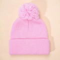 Pink knitted winter hat for kids featuring a large fluffy pom-pom and ribbed cuff - One Size / Pink