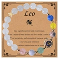 Detail of handmade Leo zodiac bracelet with white beads and gold star charm on retro card - Leo-Style 3