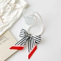 Detail of French vintage pearl necklace with a black and white striped silk scarf bow - Black White Stripes
