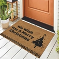Faux coir Christmas doormat with 'Merry Christmas' text on wooden floor entrance - We Wish You (CHDT-2024-01292)