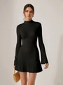 Detail shot of black knitted dress with pleated hem and elegant flared sleeve cuffs - S / Black
