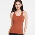 Eng anliegendes Yoga-Top in gebranntem Orange aus Rippstrick mit integrierten Pads - S (Größe 4 / 42.5-50kg) / Karamell-Orange