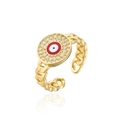 Detail eines goldenen Evil Eye Rings mit Panzerketten-Band und Kristallbesatz - Roter Böser Blick Stil (11918)