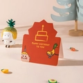 Red cartoon Happy Birthday card featuring cake and duck illustrations on pink backdrop - Birthday Cake