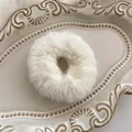 Close-up of white plush scrunchie showing the soft texture and 4cm inner diameter - White Plush