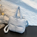 Chic light blue puffer tote bag with quilted pattern and soft padded shoulder strap - Blue