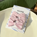Close-up of three pink striped fabric bow hair clips displayed on a ceramic tray - Bow Duckbill Clips 3Pcs Set / Pink Stripe