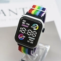 Digital sports watch featuring a vibrant rainbow woven strap and white rectangular case - Rainbow Color