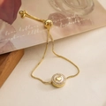 18K gold plated heart shell charm bracelet with zirconia inlay on warm aesthetic background - Heart Style (32018)
