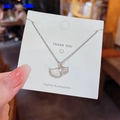Silver ginkgo leaf necklace with white shell inlay and sparkling crystals on white card - X364 Silver Ginkgo Leaf Shell