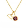 Gold-plated stainless steel necklace with bat-shaped pendant and red zircon stone - January