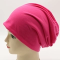 Slouchy knitted beanie in vibrant rose pink color for men and women's casual style - Adjustable / Rose Red