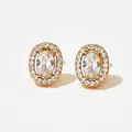 Elegant gold oval stud earrings with large clear center zircon and diamond halo - Golden Oval White Stone Style (KDE1080)