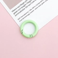 Macro detail of a 25mm light green matte metal O-ring with spring clasp closure - Light Green