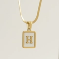 Gold rectangular pendant necklace with white shell inlay and letter H on snake chain - Letter H