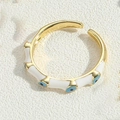 Verstelbare gouden evil eye ring met wit emaille en blauwe zirkonia inlegwerk - Verstelbaar Open-Stijl 2 / Wit