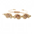 Detail of bohemian woven bracelet with seashell charms and gold beads on white surface - Copper Beads + Khaki Snail