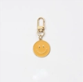 Golden alloy keychain featuring a vibrant yellow enamel smiley face pendant for bags - 3CM Smile Face B with Hook