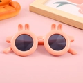 Cute peach pink cartoon sunglasses for kids featuring 3D bunny ears and round lenses - Pink Frame Grey Lens