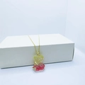 Golden necklace with a pink and yellow gradient crystal bear pendant and stars - Necklace / Yellow Pink