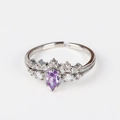 Detail of 18K silver adjustable ring featuring a pear-cut purple zircon crown design - Purple Pear Vintage White Gold Style (Style 11 White Gold)