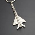 Silver fighter jet model keychain with metal alloy airplane pendant on black background - Silver J-8 Fighter Jet