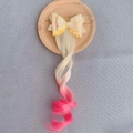 Detail of glitter bow hair clip with gold to pink gradient wavy hair extensions - Beige Gradient Rose Red