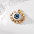 Gold evil eye pendant charm with blue resin pupil and beaded edge for DIY jewelry - Blue Bead Eye