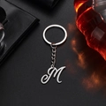 Vintage-Schlüsselanhänger aus Silber mit geschwungenem Buchstaben M Metall - M