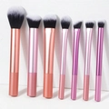7-teiliges Make-up-Pinsel-Set mit Roségold-Verlauf-Griffen und zweifarbigen Borsten auf Weiß - 7-teilig Mehrfarbiger Rosa Griff
