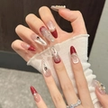 Handmade wine red cat eye press-on nails with French almond shape and 3D pearls - 600 Long Oval (L)
