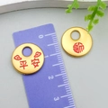 Golden alloy pendants with Chinese characters Pingan and Fu beside a measuring ruler - Fortune Safety Lock & Buckle
