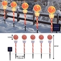 Solar Christmas lollipop garden lights with 5 stake lights and festive LED glowing bows - Red Lollipop