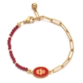 Detail of red faceted beads and golden paperclip chain bracelet with Hamsa charm - Red