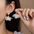 Elegant white petal drop earrings with gold metal and pearls shown on a female model - Pearl Bracket Petal Style (E7011/Silver Needle)
