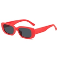 Vintage small square sunglasses with red frames and grey lenses in a 45-degree view - Red Frame Grey Lens