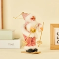 Pink sequin Santa Claus figurine with wooden skis and poles for festive holiday decor - Skiing Style (Pink Sequin)