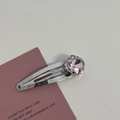 Detailed view of silver hair clip with a large faceted pink crystal on decorative card - Silver/Pink Zirconia-Small Oval