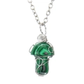 Detailed macro shot of a mushroom pendant with green malachite stone and wire wrapping - Synthetic Malachite